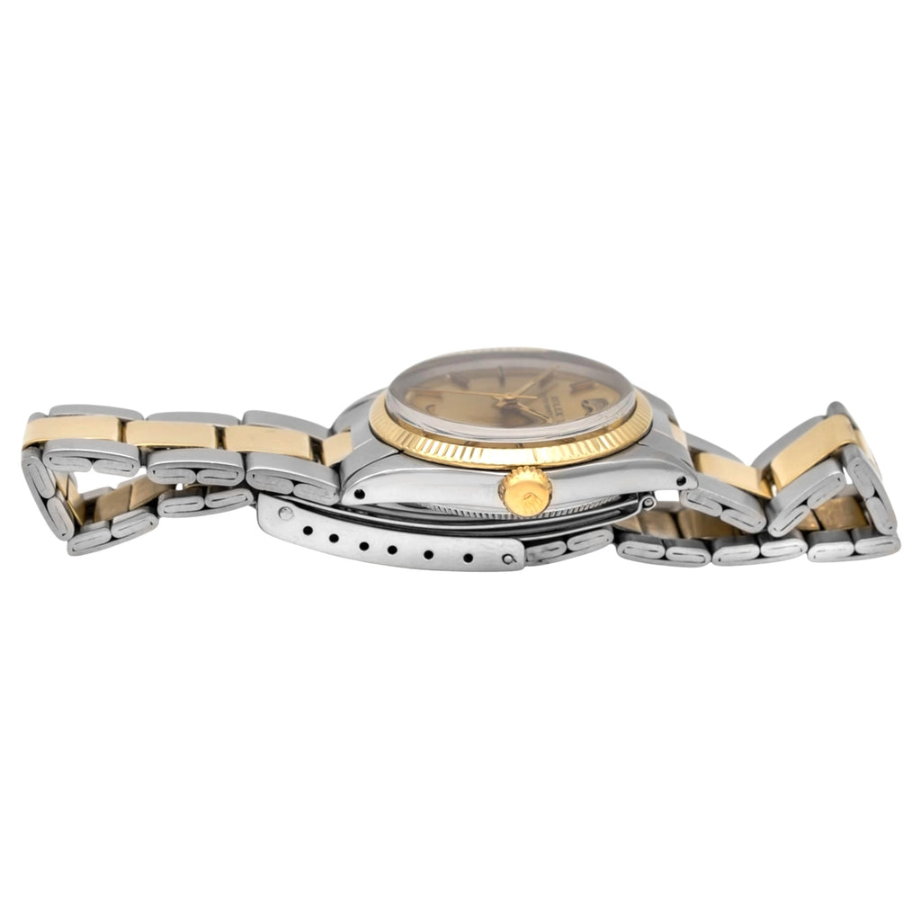 Rolex Oyster Perpetual 31 6551 Champagne Dial on Stainless steel and 18 karat yellow gold 1970